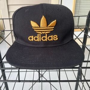 Adidas Originals black and gold snapback hat